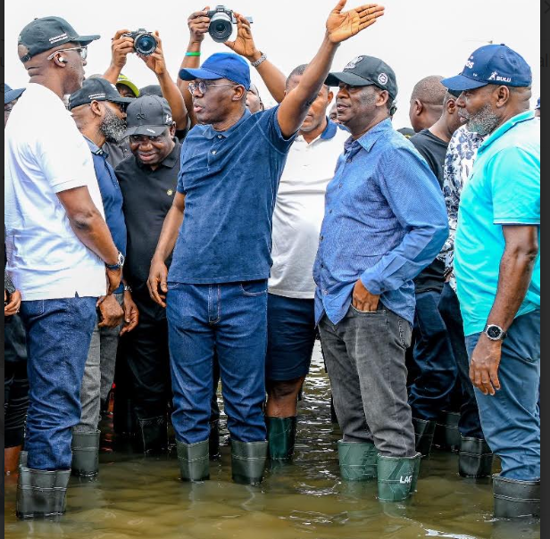 Commissioner for the Environment and Water Resources, Mr. Tokunbo Wahab; Special Adviser to the Governor on Infrastructure, Engr. Olufemi Daramola; Commissioner for Information and Strategy, Mr. Gbenga Omotoso; Governor of Lagos State, Mr. Babajide Sanwo-Olu; his Deputy, Dr. Obafemi Hamzat and the Permanent Secretary, Office of Drainage Services and Water resources, Engr. Mahmood Adegbite during an inspection visit to flood affected communities by rainfall in Lagos, on Wednesday, July 15, 2026.