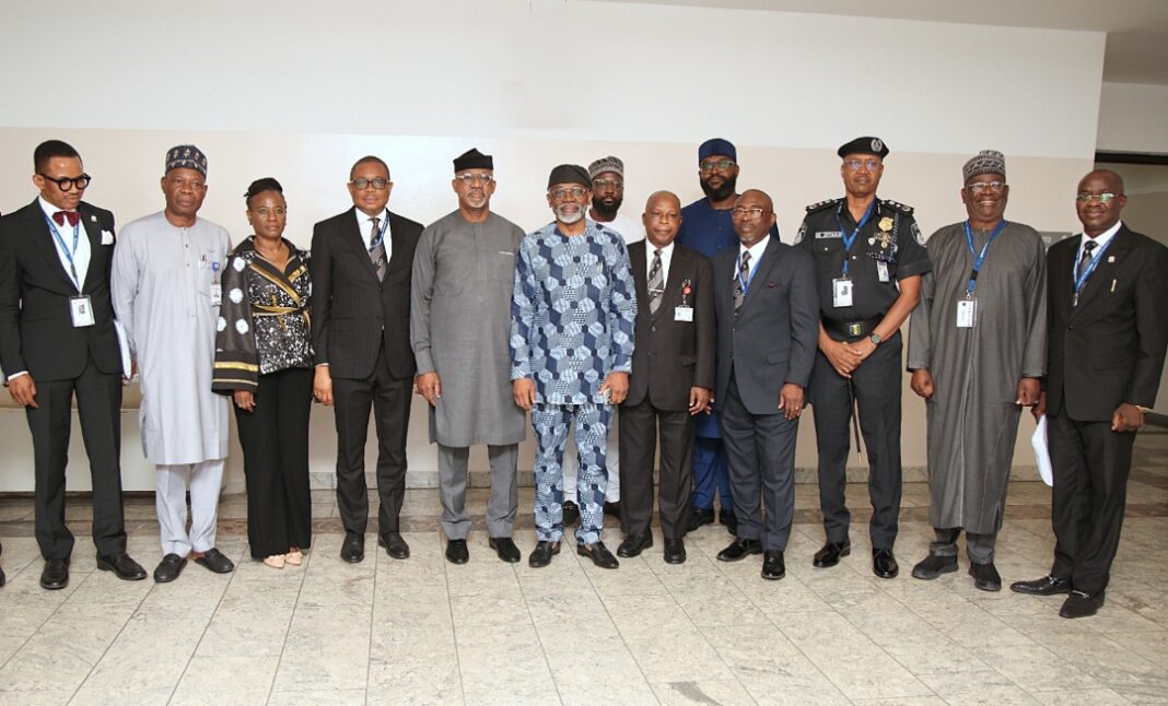 From left, Attorney General and Commissioner for Justice,Ondo State, Dr. Olukayode Ajulo (SAN); DG National Institute of Police Studies, Prof. Olu Ogunsakin; Senior Special Assistant to the President on Administration and Operations, Mrs Oyinade Nathan-Marsh; President Nigeria Bar Association, Mazi Afam Osigwe (SAN); Chairman NGF Committee on State Police/Governor of Ogun State, Prince Dapo Abiodun; Chief of Staff to the President, Rt. Hon. Femi Gbajabiamila; Special Assistant to the President on Legal Matters, Tomi Belgore; Attorney General of the Federation and Minister for Justice, Chief Lateef Olasunkanmi Fagbemi (SAN); Senior Special Assistant to the President on Planning and Research, Mr. Dubem Moghalu; Attorney General Lagos State and Commissioner for Justice, Mr. Lawal Pedro (SAN); Representative of Inspector General of Police, DIG Isyaku Mohammed; Director General NGF Secretariat, Dr. Adulateef Shittu; Director General Nigeria Law Reform Commission, Prof. Dakas Dakas, in a group photograph after the Inauguration of Presidential Working Group on State Policing, at the State House Abuja. Tuesday, 7th July 2026