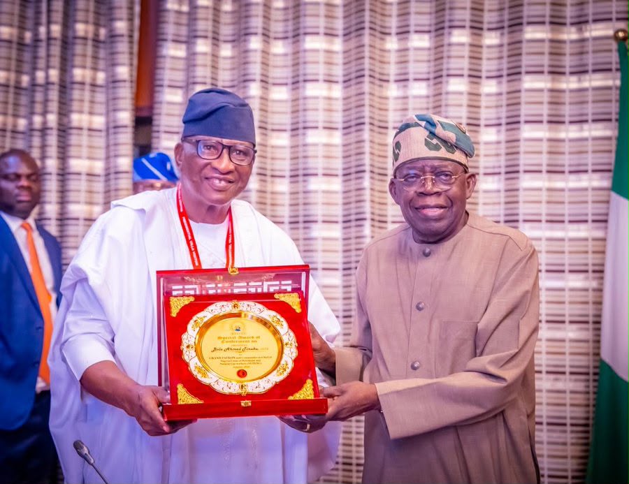 President Bola Tinubu and Comrade Salimon Akanni Oladiti