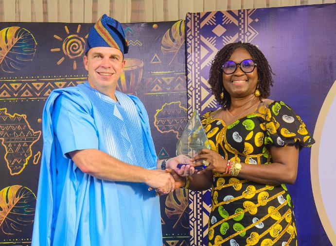 The Managing Director/CEO of First City Monument Bank (FCMB), Yemisi Edun, receiving an award of excellence from the Global Chief Executive Officer of the Information Systems Audit and Control Association (ISACA), Erik Prusch, during the ISACA Lagos Chapter’s 30th anniversary celebration and awards held in Lagos on August 21, 2026.