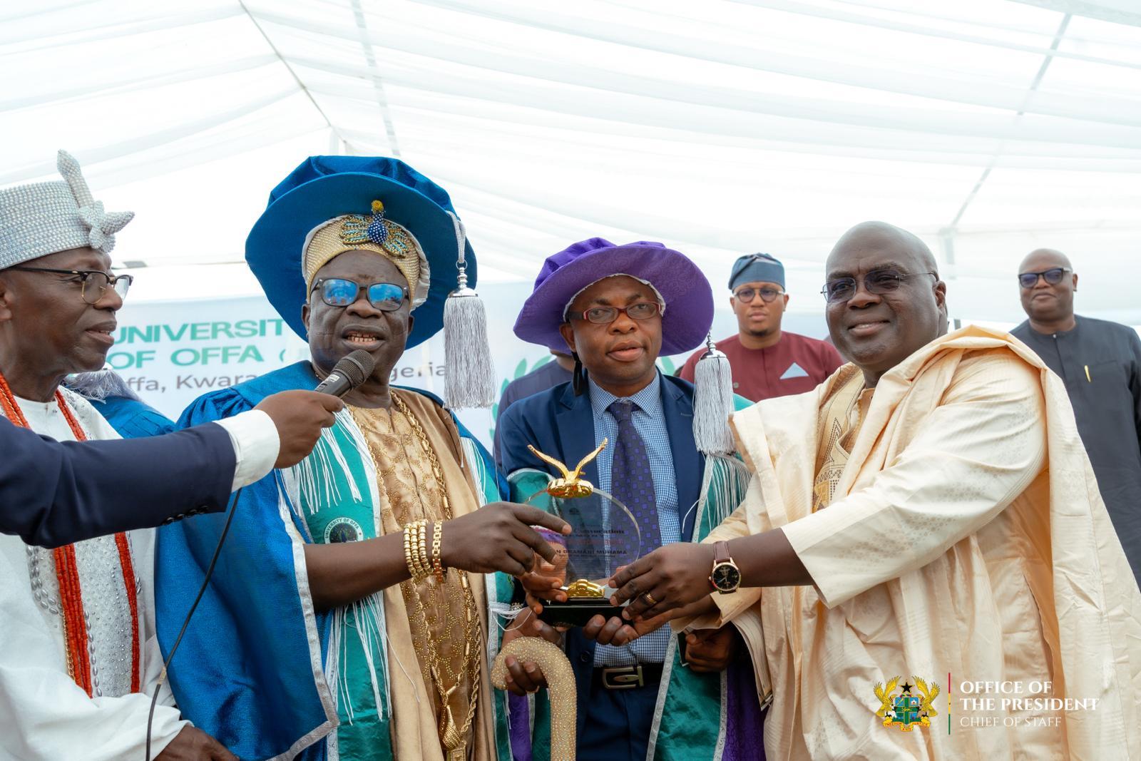 Dr. Debrah receiving the award from the Pro-Chancellor, the Olofa of Offa, and the institution’s VC