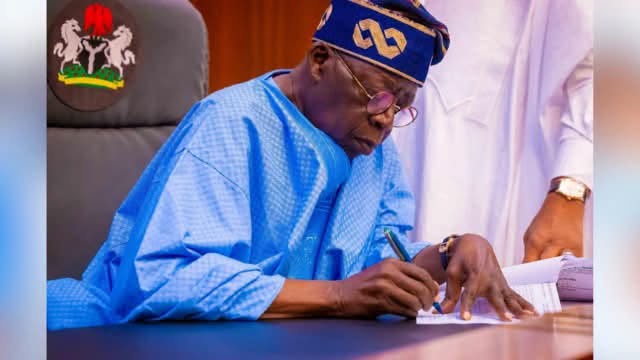 President Bola Tinubu signing