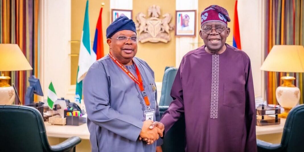 President Bola Tinubu, right, and Mr Joseph Olasunkanmi Tegbe