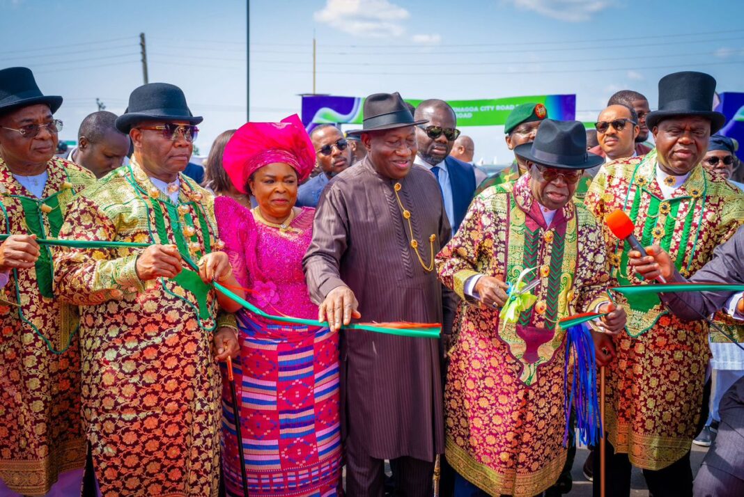 President Tinubu commissioning one of the projects, while Senate President Akpabio, former President Jonathan, Governor Diri, and others look on