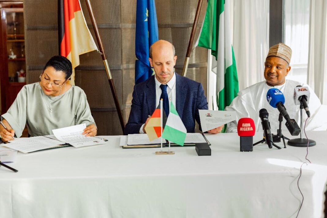 L-R: Minister of State, Budget and Economic Planning, Dr Doris Uzoka-Anite; Deputy Director-General of Germany’s Federal Ministry for Economic Cooperation and Development (BMZ), Mr Philip Knill; and Minister of Budget and Economic Planning, Senator Abubakar Bagudu, during the signing of the Summary Record of the Nigeria-Germany Government Negotiation on Development Cooperation in Abuja on Thursday, 14/05/26. PHOTO: FMBEP