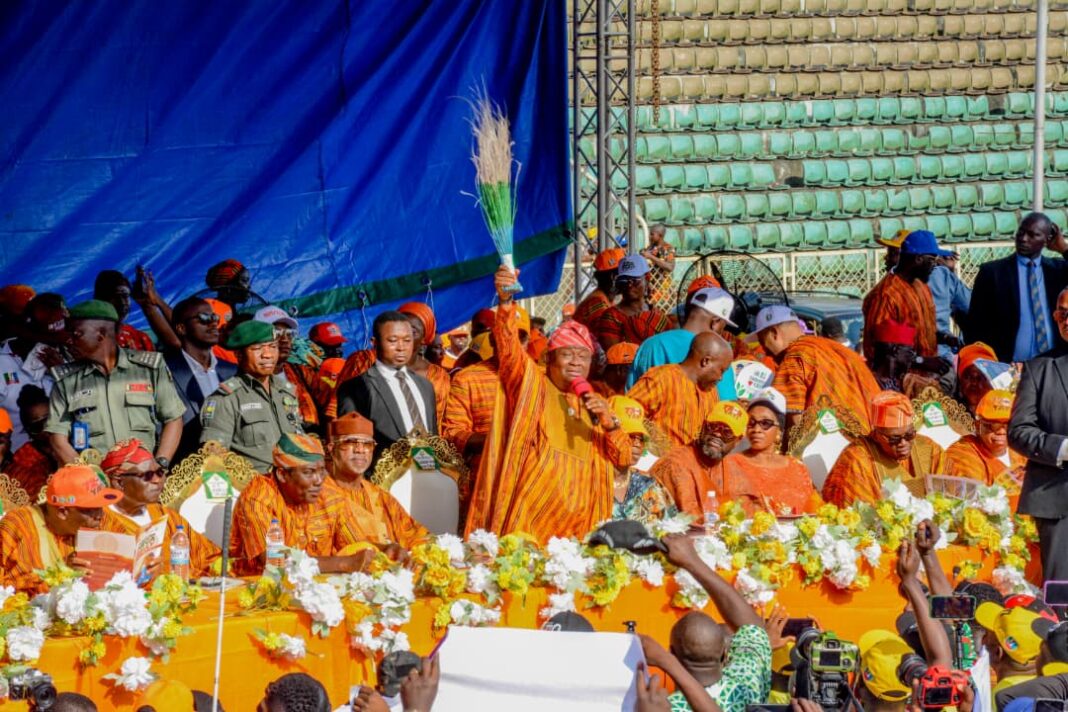 Governor Abiodun, sitting 4th left, Senator Olamilekan Adeola, holding the broom and others at the rally