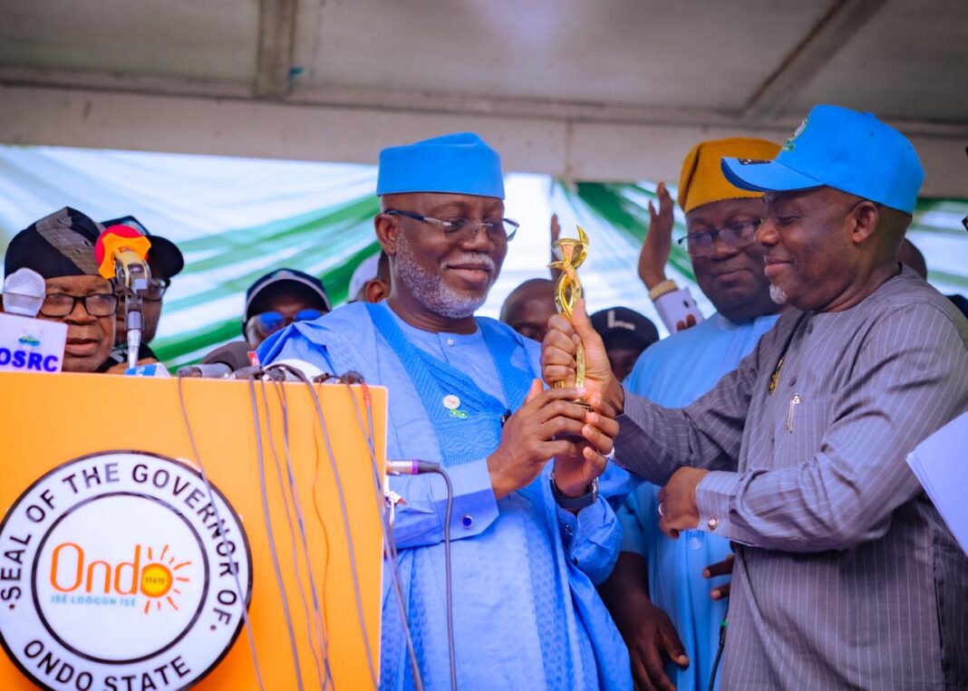 Education Minister, Dr. Tunji Alausa (right) presenting Ondo State Governor Lucky Aiyedatiwa with the Best Governor in Education Award in Abuja, to mark the World Teachers' Day, recently